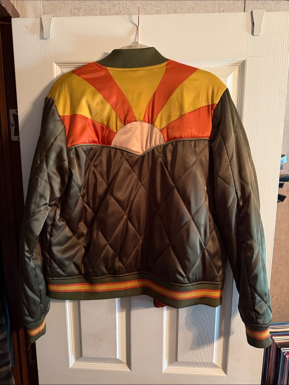 Needles Olive Quilted Bomber with Orange & Yellow Sunburst